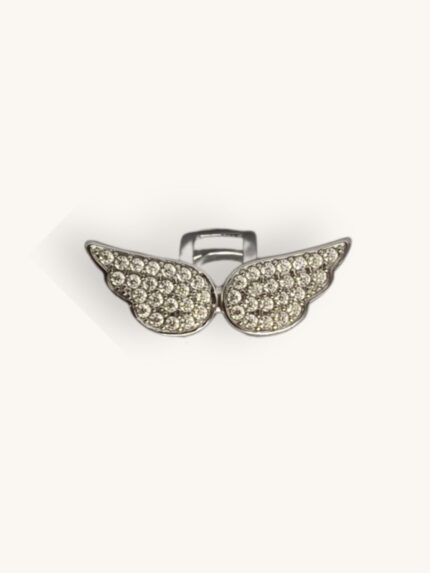 Ασημί ear cuff από ανοξείδωτο ατσάλι με σχέδιο φτερά αγγέλου και λαμπερά ζιρκονάκια.